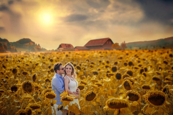 This image was made in the Tuscany region, Italy. We searched for hours a sunflower plantation, and at that time was already the end of the bloom .. Luckily we found those that were still open!